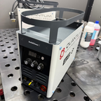 Quantum SolidClean machine on a metal surface with visible branding